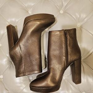 Jessica Simpson almond toe ankle boot.  Bronze color with a side zip